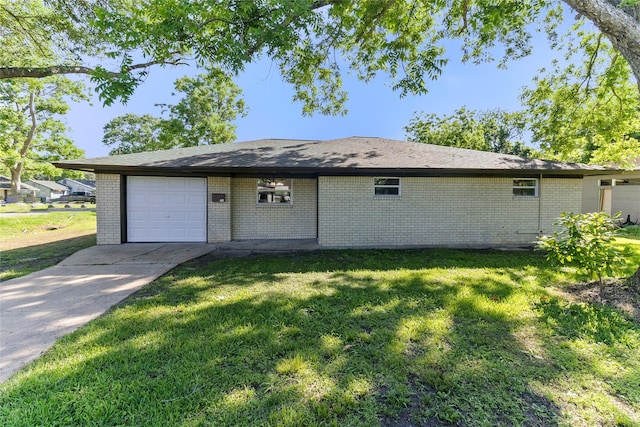401 S Fig St, Sweeny, TX 77480 - single story home featuring brick siding, driveway, an attached garage, and a front yard