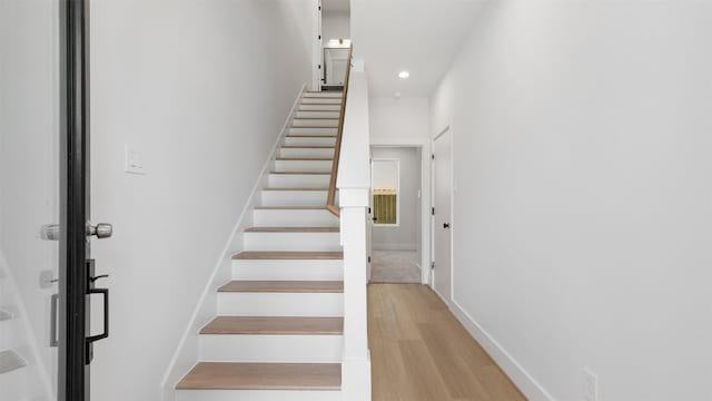3605 Mount Pleasant St, Houston, TX 77021 - stairs with recessed lighting, baseboards, and wood finished floors