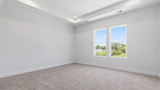 3605 Mount Pleasant St, Houston, TX 77021 - empty room with baseboards, carpet flooring, recessed lighting, and a raised ceiling