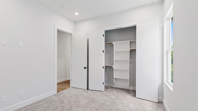 3605 Mount Pleasant St, Houston, TX 77021 - unfurnished bedroom with carpet floors, baseboards, a walk in closet, recessed lighting, and a closet