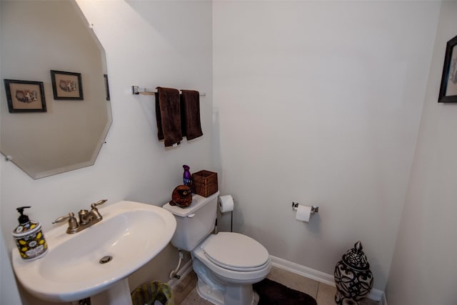 20018 Rene Creek Ct, Spring, TX 77388 - bathroom with a sink, toilet, and baseboards
