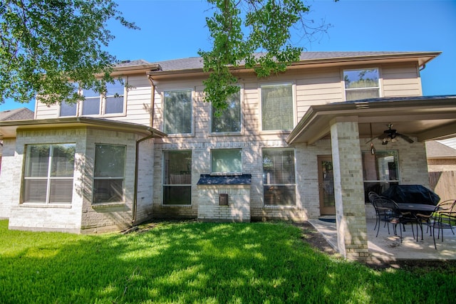20018 Rene Creek Ct, Spring, TX 77388 - back of house featuring ceiling fan, a patio, and a lawn