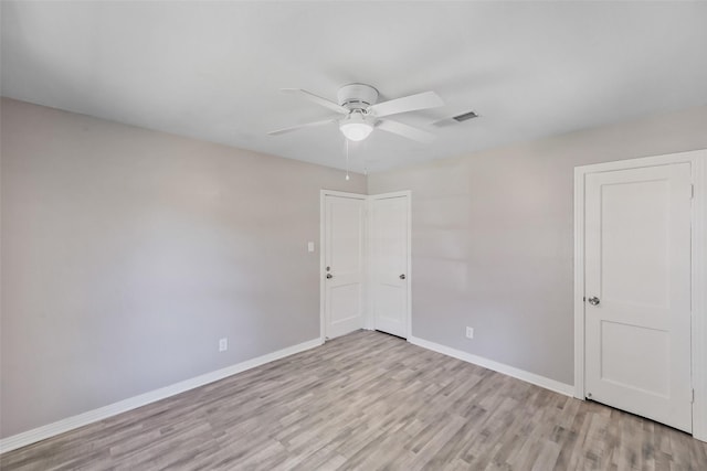 8527 Brower St, Houston, TX 77017 - unfurnished room featuring a ceiling fan, light wood-style floors, and baseboards