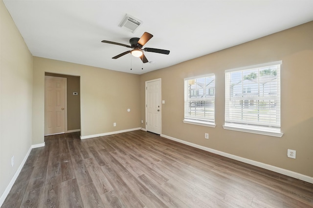 3615 Seabrook St, Houston, TX 77021 - empty room featuring wood finished floors, baseboards, and ceiling fan