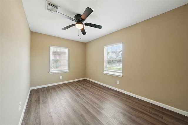 3615 Seabrook St, Houston, TX 77021 - empty room with wood finished floors, baseboards, and a ceiling fan