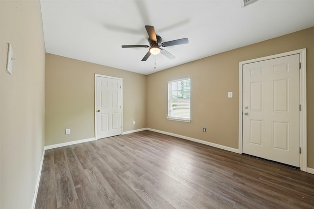 3615 Seabrook St, Houston, TX 77021 - empty room featuring wood finished floors, baseboards, and ceiling fan