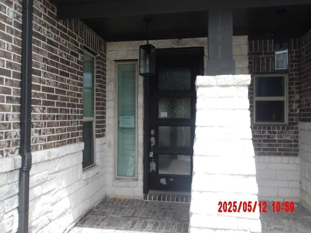 3817 Hawthorn Shadow Ct, Spring, TX 77386 - property entrance with brick siding