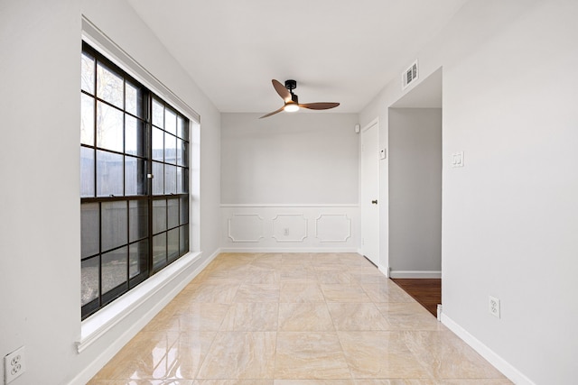 10328 Longmont Dr Unit 47/1, Houston, TX 77042 - unfurnished room with a ceiling fan and baseboards