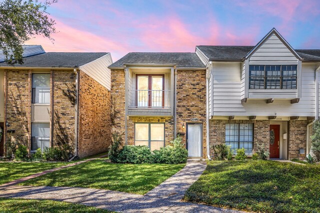 10328 Longmont Dr Unit 47/1, Houston, TX 77042 - multi unit property with brick siding and a yard