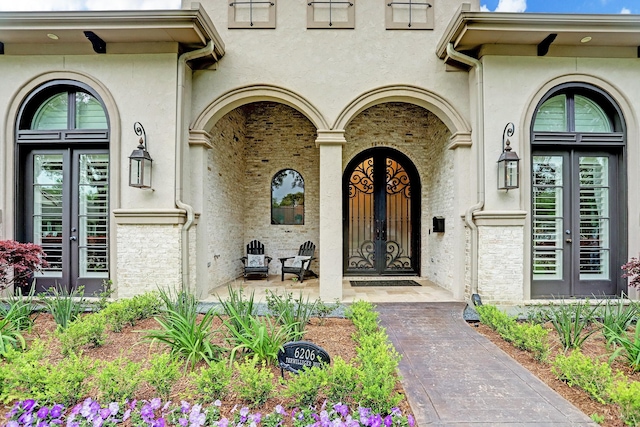 6206 Terwilliger Way, Houston, TX 77057 - property entrance featuring french doors and stucco siding