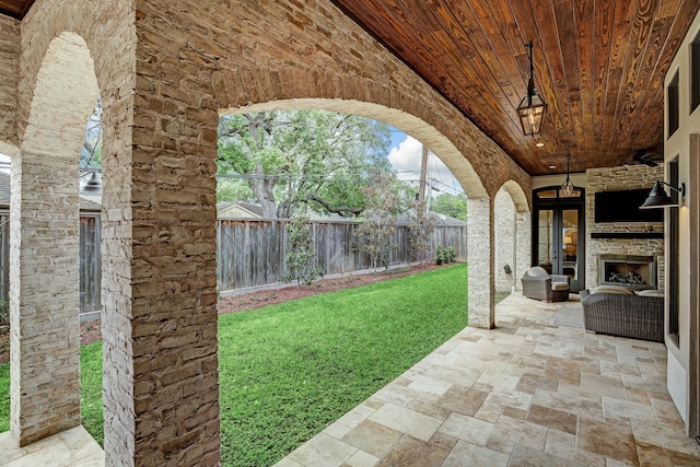 6206 Terwilliger Way, Houston, TX 77057 - view of patio with an outdoor living space with a fireplace