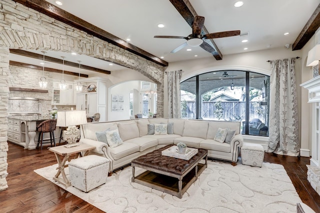 6206 Terwilliger Way, Houston, TX 77057 - living area with dark wood-type flooring, beamed ceiling, arched walkways, a ceiling fan, and recessed lighting