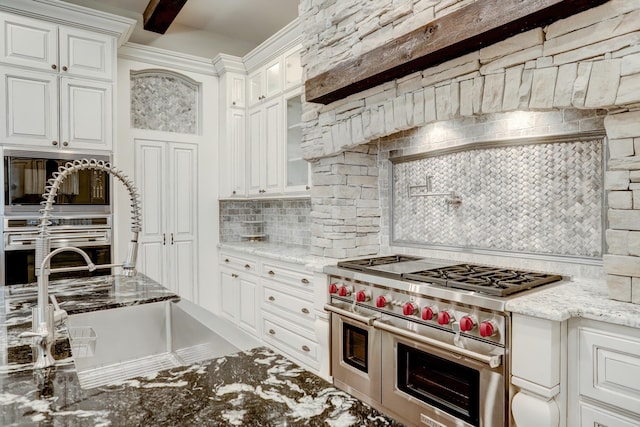 6206 Terwilliger Way, Houston, TX 77057 - kitchen featuring range with two ovens, backsplash, and white cabinets