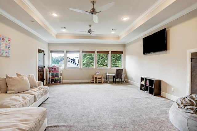 6206 Terwilliger Way, Houston, TX 77057 - living area with a ceiling fan, carpet, a raised ceiling, crown molding, and baseboards