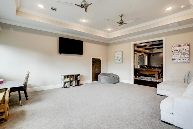 6206 Terwilliger Way, Houston, TX 77057 - carpeted living area with ceiling fan, ornamental molding, a tray ceiling, baseboards, and recessed lighting