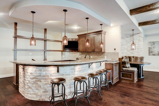 6206 Terwilliger Way, Houston, TX 77057 - bar featuring backsplash, dark wood-style flooring, baseboards, hanging light fixtures, and beamed ceiling