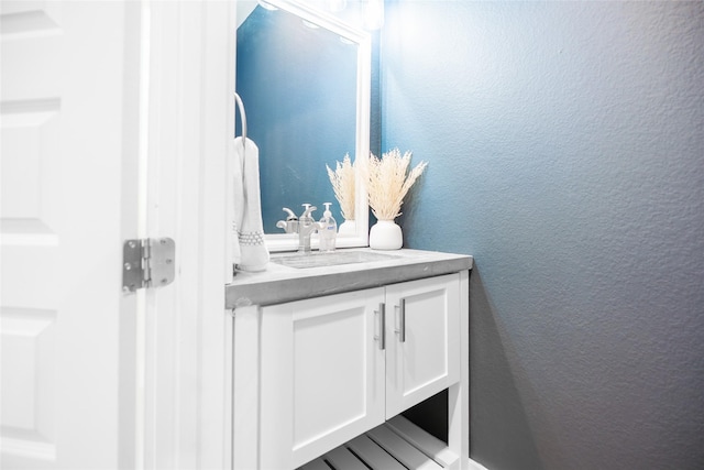 12422 Texas Army Trl, Cypress, TX 77429 - bathroom featuring vanity and a textured wall
