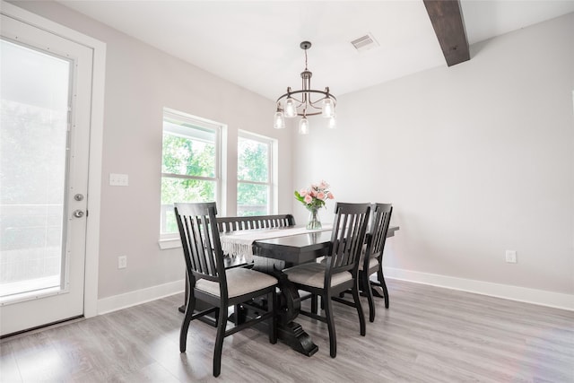 12422 Texas Army Trl, Cypress, TX 77429 - dining space featuring a chandelier, light wood-type flooring, baseboards, and beam ceiling
