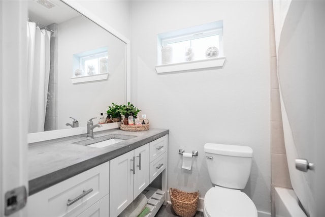 12422 Texas Army Trl, Cypress, TX 77429 - bathroom with toilet, vanity, and a shower with curtain