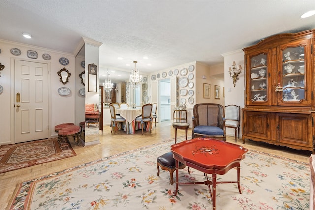 495 N Post Oak Ln, Houston, TX 77024 - living area with crown molding, a chandelier, a textured ceiling, baseboards, and recessed lighting