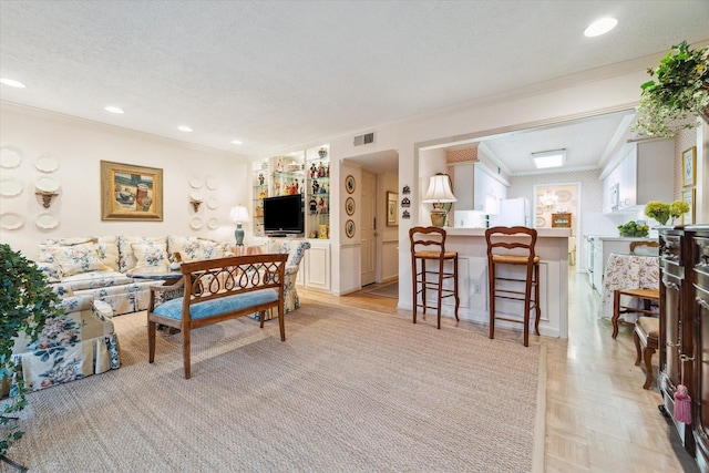 495 N Post Oak Ln, Houston, TX 77024 - living area with ornamental molding, light wood-type flooring, and recessed lighting