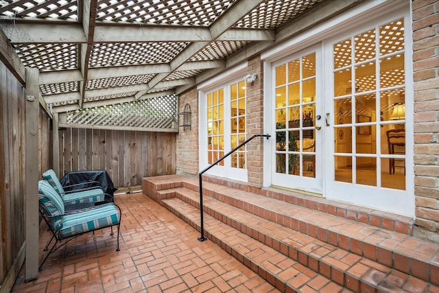 495 N Post Oak Ln, Houston, TX 77024 - view of patio / terrace featuring fence, french doors, and entry steps