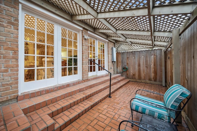 495 N Post Oak Ln, Houston, TX 77024 - view of patio / terrace with french doors and a fenced backyard