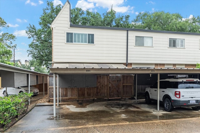 495 N Post Oak Ln, Houston, TX 77024 - view of front of property with covered parking
