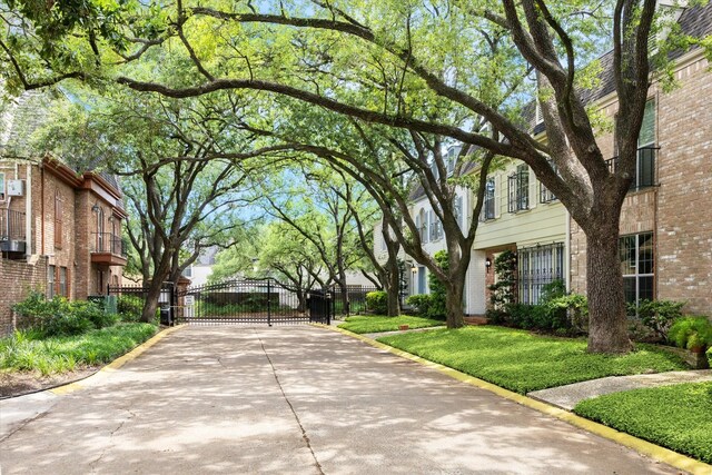 495 N Post Oak Ln, Houston, TX 77024 - view of home's community featuring a gate, fence, and a residential view