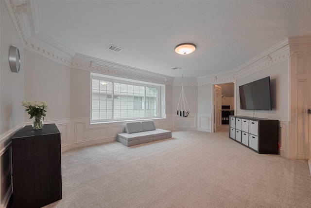 12438 Piping Rock Dr, Houston, TX 77077 - living room featuring a decorative wall, crown molding, carpet, and a wainscoted wall