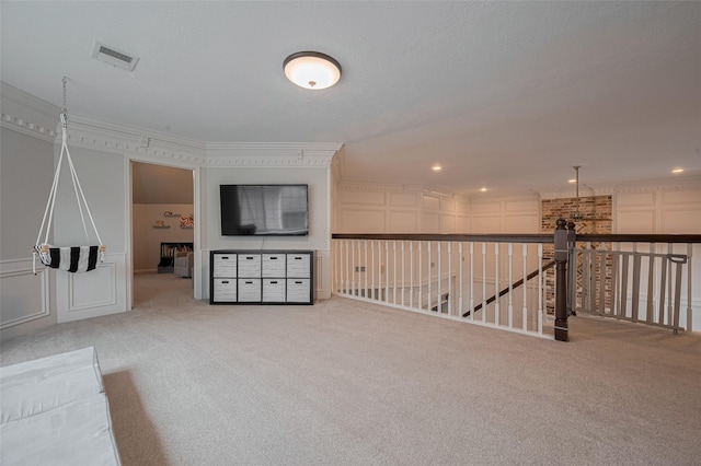 12438 Piping Rock Dr, Houston, TX 77077 - unfurnished living room with carpet, ornamental molding, and recessed lighting