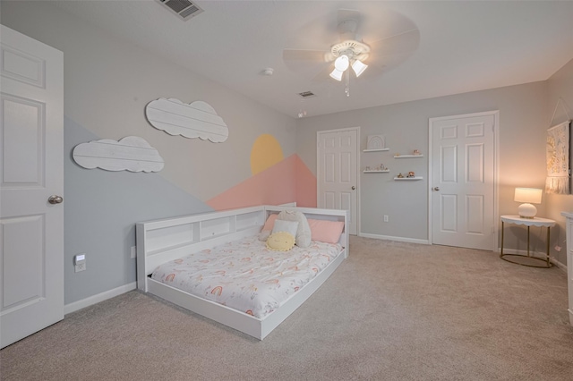 12438 Piping Rock Dr, Houston, TX 77077 - carpeted bedroom featuring baseboards and a ceiling fan