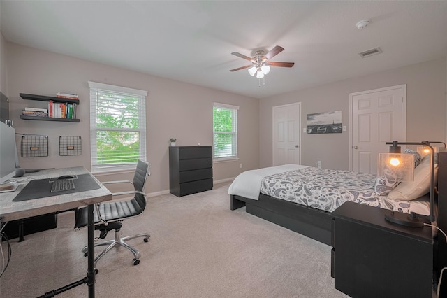 12438 Piping Rock Dr, Houston, TX 77077 - carpeted bedroom with baseboards, a desk, and ceiling fan