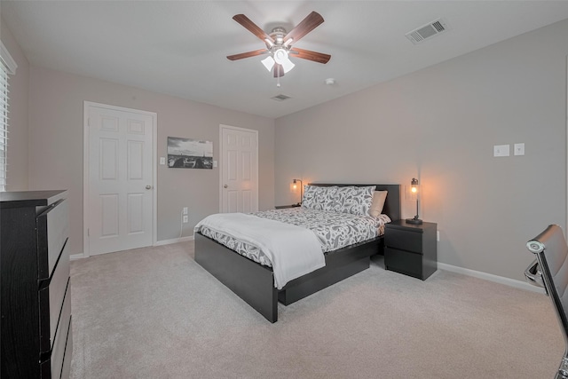 12438 Piping Rock Dr, Houston, TX 77077 - bedroom featuring light carpet, baseboards, and a ceiling fan