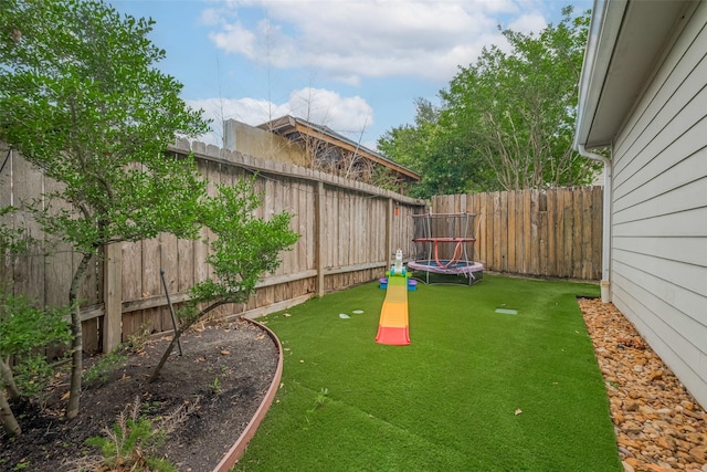 12438 Piping Rock Dr, Houston, TX 77077 - fenced backyard featuring a trampoline