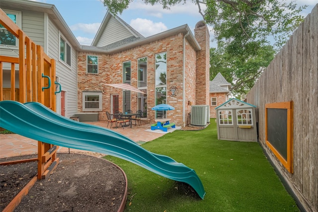 12438 Piping Rock Dr, Houston, TX 77077 - view of jungle gym with central air condition unit and a patio area