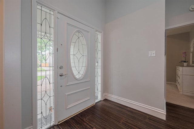 12438 Piping Rock Dr, Houston, TX 77077 - foyer with dark wood-type flooring and baseboards