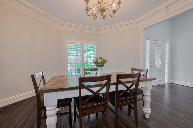 12438 Piping Rock Dr, Houston, TX 77077 - dining room featuring a chandelier, baseboards, dark wood-style flooring, and crown molding