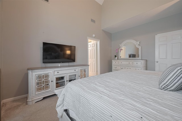 12438 Piping Rock Dr, Houston, TX 77077 - bedroom with carpet floors, baseboards, and a high ceiling