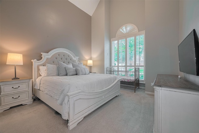 12438 Piping Rock Dr, Houston, TX 77077 - bedroom with high vaulted ceiling and light carpet
