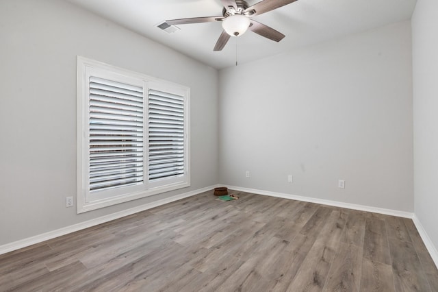 25818 Overlake Dr, Spring, TX 77380 - spare room with wood finished floors and a ceiling fan