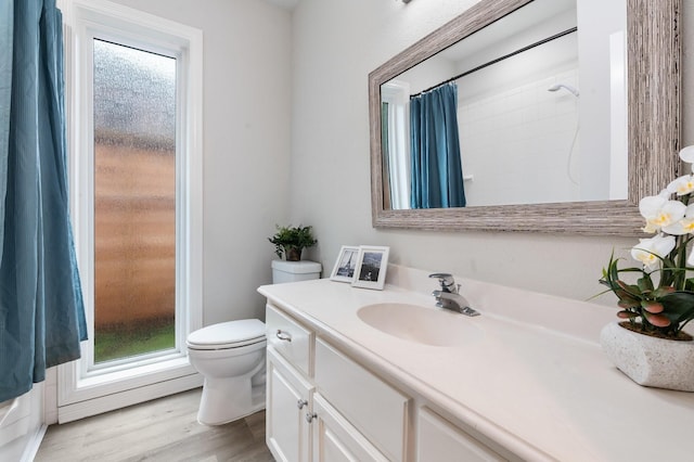 25818 Overlake Dr, Spring, TX 77380 - bathroom with vanity, wood finished floors, and curtained shower