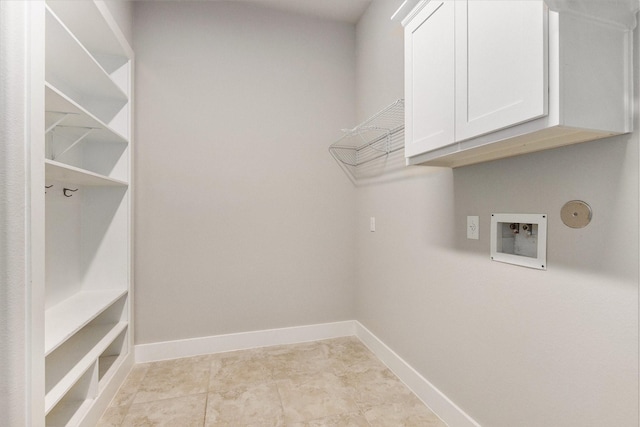 28622 Mountain Timber Ct, Fulshear, TX 77441 - laundry room featuring hookup for a washing machine, baseboards, and cabinet space