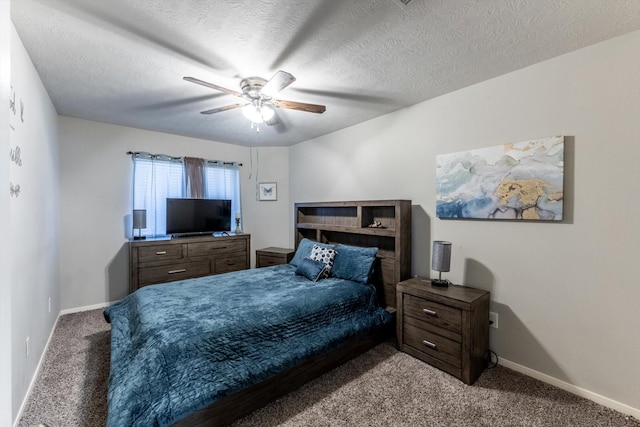 13507 Beech Ridge Ln, Houston, TX 77083 - carpeted bedroom with baseboards, a ceiling fan, and a textured ceiling
