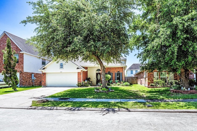 13507 Beech Ridge Ln, Houston, TX 77083 - view of front of house featuring brick siding and driveway