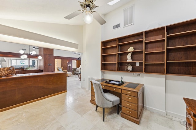 2414 Baycrest Dr, Houston, TX 77058 - office area with ceiling fan, high vaulted ceiling, and baseboards