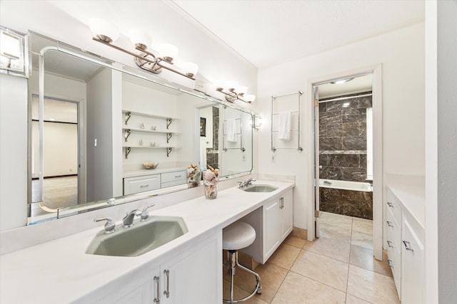 2414 Baycrest Dr, Houston, TX 77058 - bathroom with a tub, double vanity, tile patterned floors, and crown molding