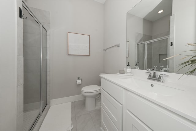 413 Stratus View Ct, Katy, TX 77493 - bathroom with a stall shower, toilet, vanity, and baseboards