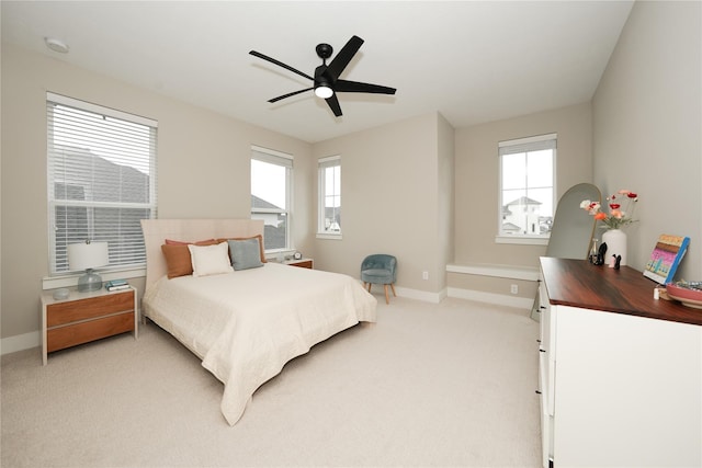 413 Stratus View Ct, Katy, TX 77493 - bedroom featuring light carpet, baseboards, and ceiling fan