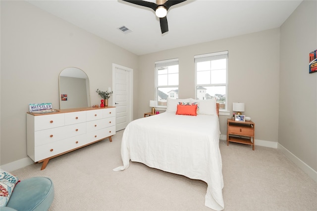 413 Stratus View Ct, Katy, TX 77493 - bedroom with light carpet, baseboards, and ceiling fan
